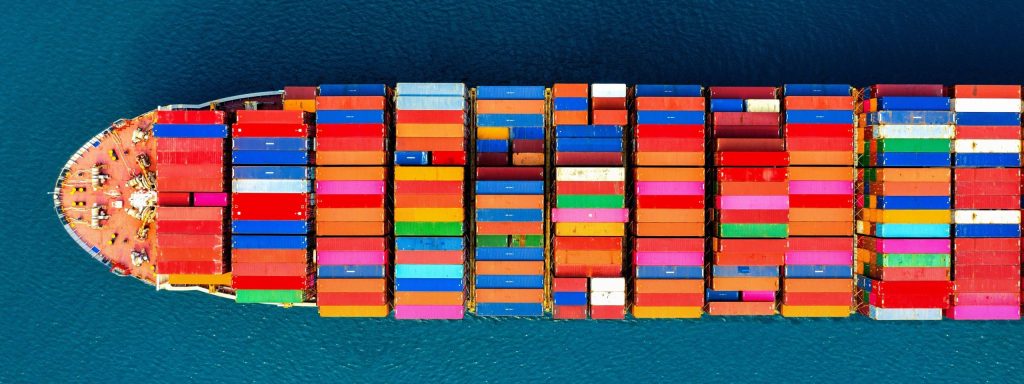 aerial view of container cargo ship in sea 1 scaled 1